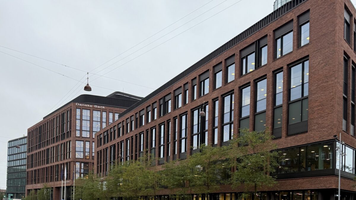 Autonomous Agentic Banking Arrives: Danske Bank and Mastercard Complete First Machine-Initiated Commercial Transaction Danske Bank corporate headquarters in Copenhagen Denmark pioneering autonomous agentic payments with Mastercard